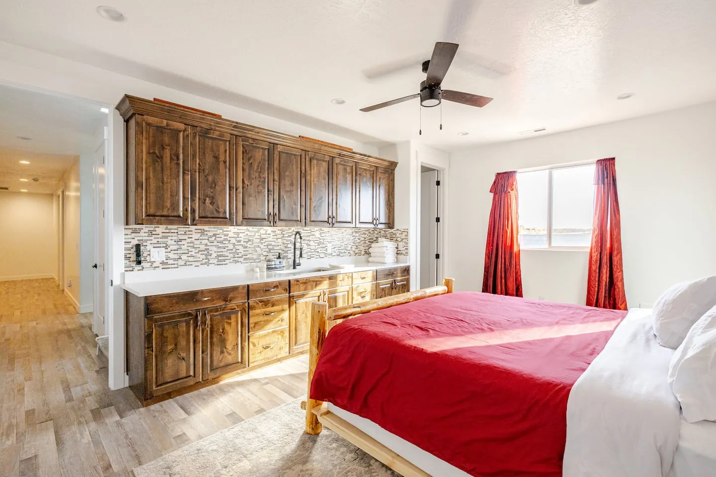 Bedroom suite with a kitchenette along one wall